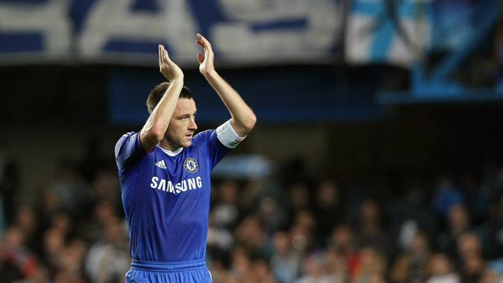 Chelsea defender John Terry applauds the crowd