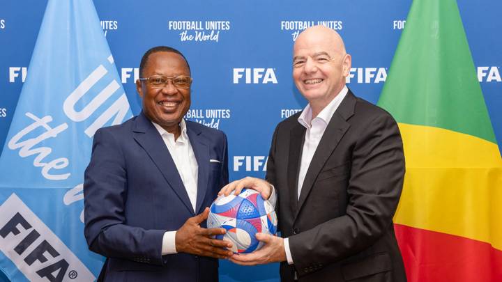 PARIS, FRANCE - JULY 30: FIFA President Gianni Infantino and Congolese Football Association President Jean-Guy Blaise Mayolas pose for a photo with Olympic Games Paris 2024 official match ball during a meeting between FIFA and Congolese Football Association at FIFA's Paris office on July 30, 2024 in Paris, France. (Photo by Léo-Paul Ridet/FIFA)