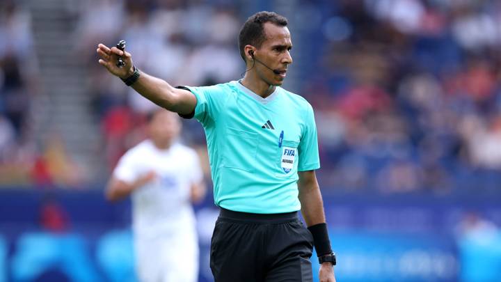 PARIS, FRANCE - JULY 24: Referee Dahane Beida gestures during the Men's group C match between Uzbekistan and Spain during the Olympic Games Paris 2024 at Parc des Princes on July 24, 2024 in Paris, France. (Photo by Alex Grimm - FIFA/FIFA via Getty Images)