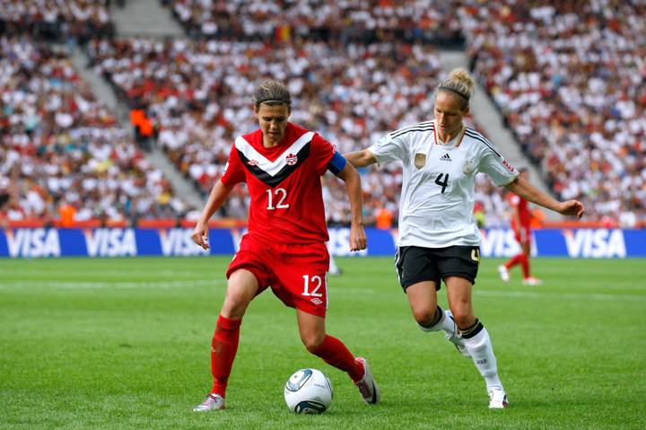  Babett Peter shadows Christine Sinclair in 2011 