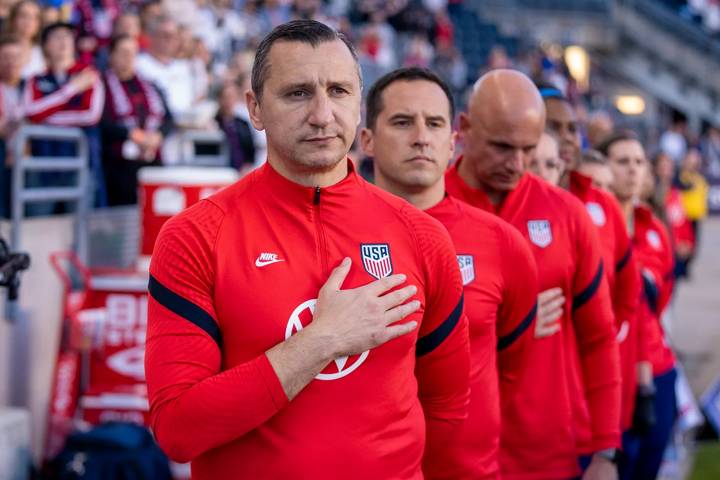 USA coach Vlatko Andonovski stands for the national anthem before a game 