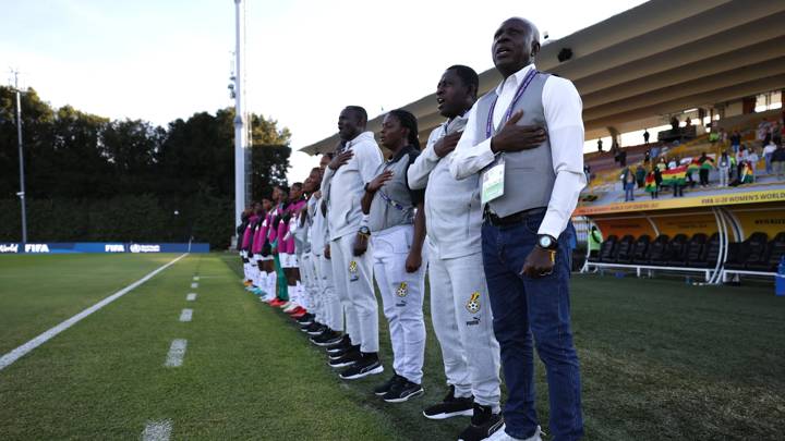 BOGOTA, COLOMBIA - SEPTEMBER 05:  Yussif Basigi, Head Coach of Ghana, lines up for the national anthem prior to the FIFA U-20 Women's World Cup Colombia 2024 match between Japan and Ghana at Estadio Metropolitano de Techo on September 05, 2024 in Bogota, Colombia. (Photo by Buda Mendes - FIFA/FIFA via Getty Images)