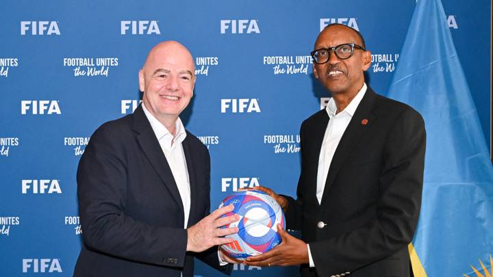 PARIS, FRANCE - JULY 26: FIFA President Gianni Infantino and President of the Republic of Rwanda Paul Kagame pose for a photo with a football at FIFA's Paris office on July 26, 2024 in Paris, France. (Photo by Harold Cunningham/FIFA)