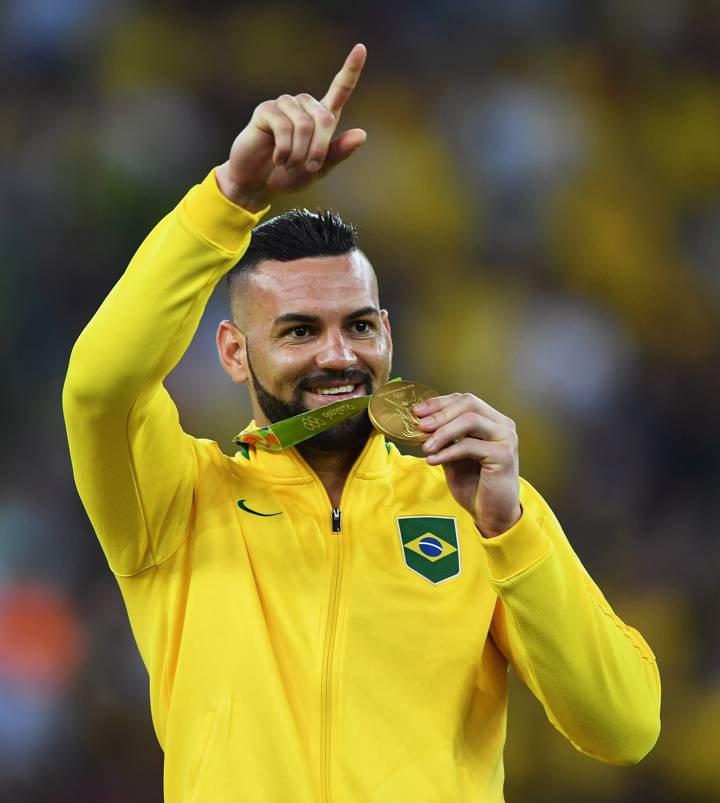 Weverton of Brazil celebrates winning Olympic gold