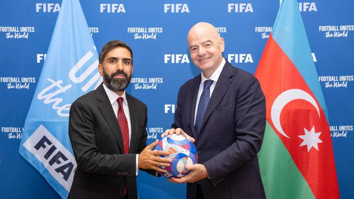 PARIS, FRANCE - JULY 29: FIFA President Gianni Infantino and Association of Football Federations of Azerbaijan (AFFA) President Rovshan Najaf pose for a photo with an at FIFA's Paris office on July 29, 2024 in Paris, France. (Photo by Léo-Paul Ridet/FIFA)