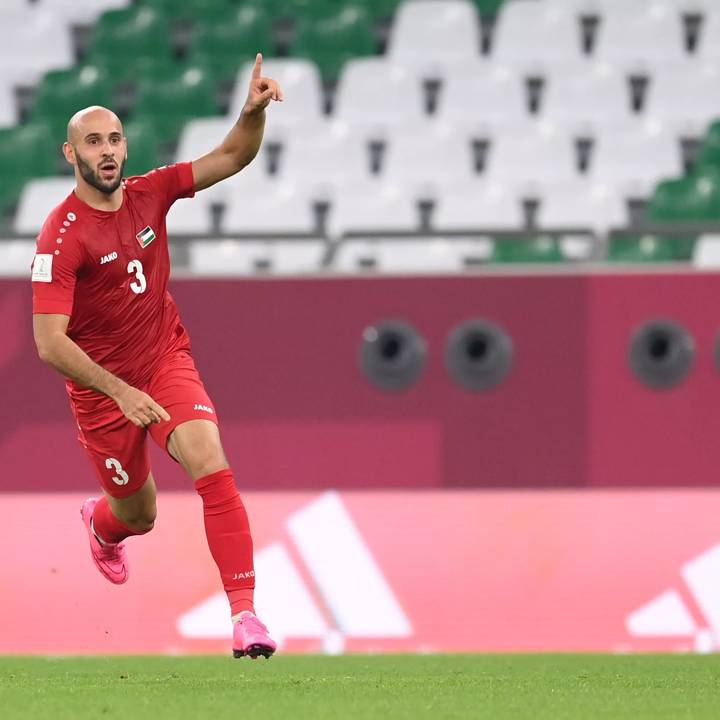 DOHA, QATAR - DECEMBER 04: Mohammed Rashid of Palestine celebrates after scoring their team's first goal during the FIFA Arab Cup Qatar 2021 Group C match between Palestine and Saudi Arabia at Education City Stadium on December 04, 2021 in Doha, Qatar. (Photo by David Ramos - FIFA/FIFA via Getty Images)