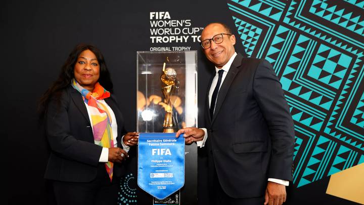 PARIS, FRANCE - MAY 21: Fatma Samoura, Secretary General of FIFA, poses for a photograph with the FIFA Women's World Cup Trophy and Philippe Diallo, President of the French Football Federation, during the FIFA Women's World Cup Trophy Tour on May 21, 2023 in Paris, France. (Photo by Catherine Steenkeste - FIFA/FIFA via Getty Images)