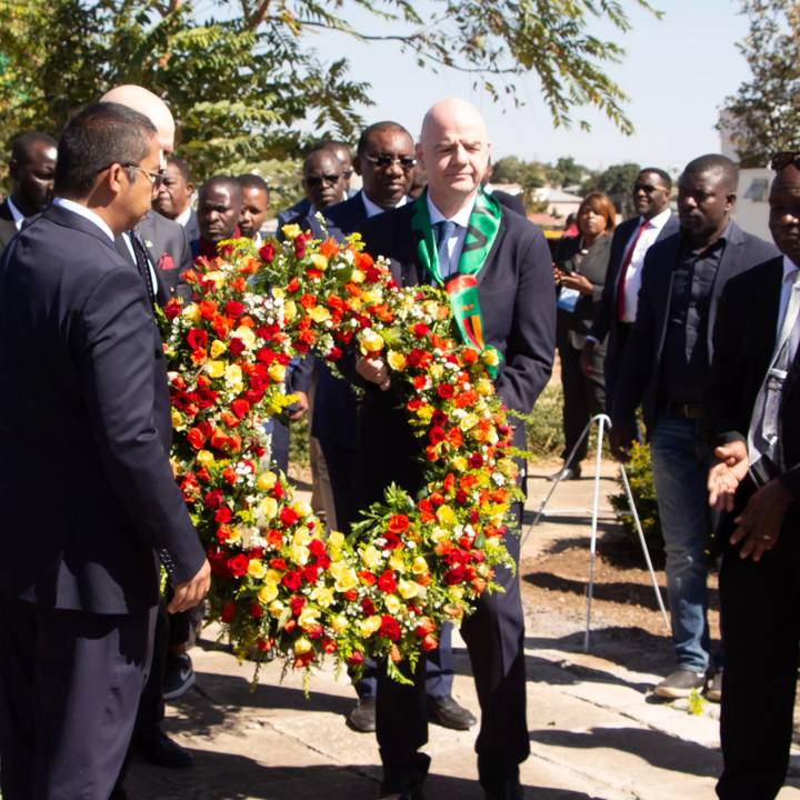 LUSAKA, ZAMBIA - JUNE 13: FIFA President Gianni Infantino lays wreath during a memorial service for the 1993 Gabon Air Disaster at Heroes' Acre as part of his visit to Zambia on June 13, 2024 in Lusaka, Zambia. (Photo by Alvin Mwewa/FIFA)