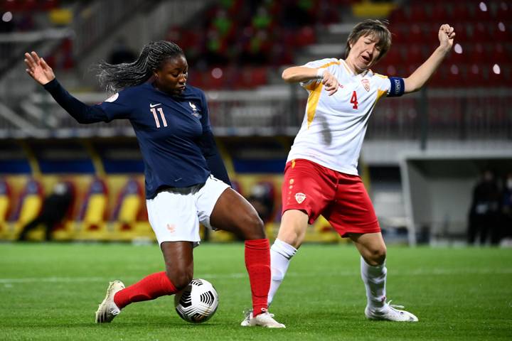 France's midfielder Kadidiatou Diani (L) vies with Macedonia's defender Katerina Mileska