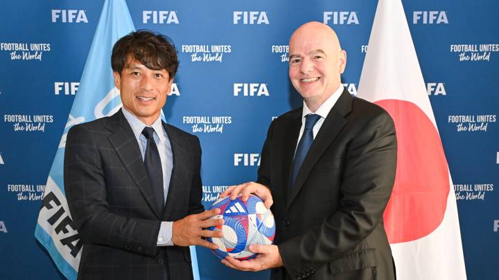 PARIS, FRANCE - AUGUST 05: FIFA President Gianni Infantino and Japan Football Association President Tsuneyasu Miyamoto pose for a photo with the Olympic Games Paris 2024 official match ball during a meeting between FIFA and Japan Football Association President at FIFA's Paris office on August 05, 2024 in Paris, France. (Photo by Harold Cunningham/FIFA)