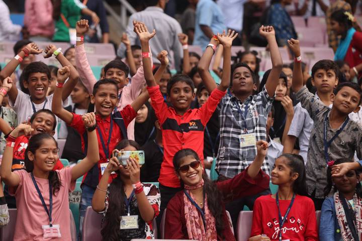 Excited children watch Mexico vs China at the DY Patil Stadium in Navi Mumbai