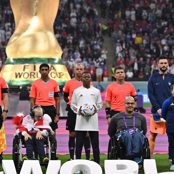 AL KHOR, QATAR - DECEMBER 10: Kia Official Match Carriers and Warm Up Experience guests during the FIFA World Cup Qatar 2022 quarter final match between England and France at Al Bayt Stadium on December 10, 2022 in Al Khor, Qatar. (Photo by Oliver Hardt - FIFA/FIFA via Getty Images)