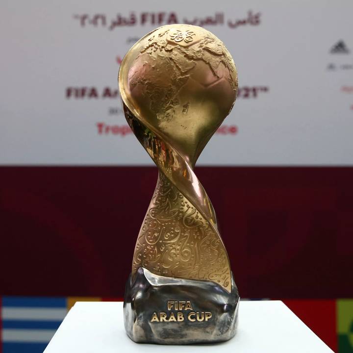 DOHA, QATAR - NOVEMBER 22:  FIFA Arab Cup Trophy is display during FIFA Arab Cup Trophy Experience - Day 1  on November 22, 2021 in Hamad International Airport, Doha, Qatar. (Photo by Mohamed Farag - FIFA/FIFA via Getty Images)