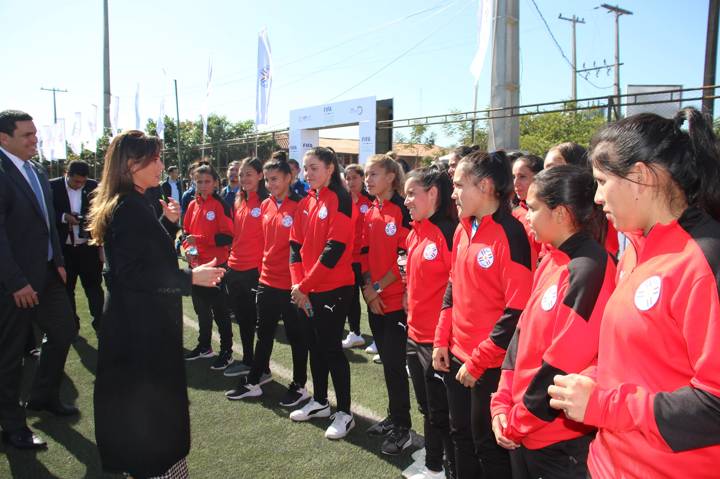 Paraguay’s First Lady Silvana López Moreira and APF's President Robert Harrison are seen with Paraguay’s woman national team during the official launch of the FIFA Football For Schools Program