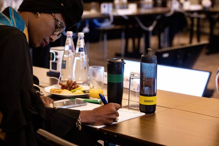 Fatou Binetou BA - Académie Génération Foot (Senegal) takes notes during Day 2 of the FIFA Diploma in Club Management 