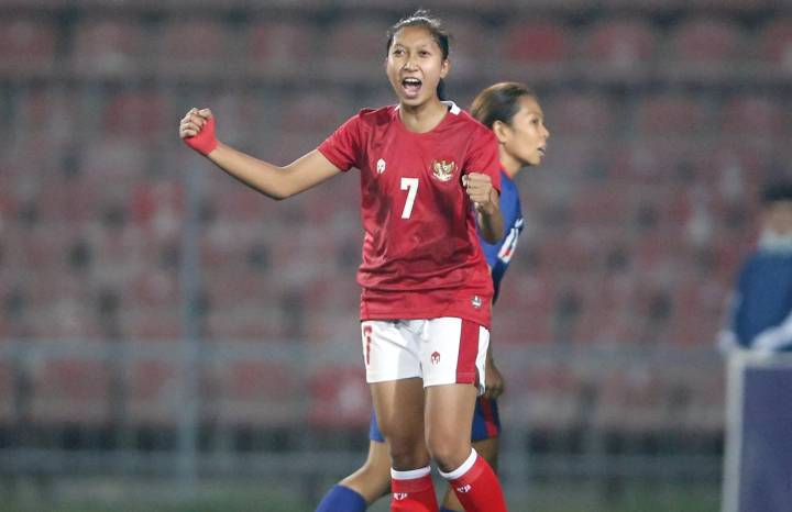 Octavianti Dwi of Indonesia celebrates after scoring a goal against Singapore