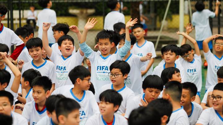 HANOI, VIETNAM - MARCH 22: Young footballers in action during a FIFA Football for Schools workshop on March 22, 2024 in Hanoi, Vietnam. (Photo by Minh Hoang/FIFA)