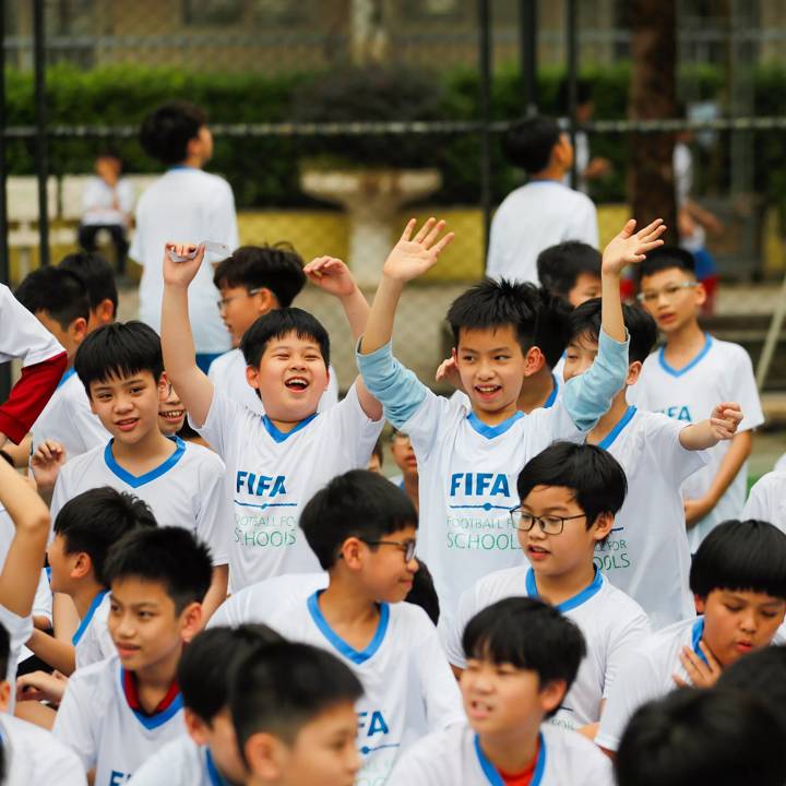 HANOI, VIETNAM - MARCH 22: Young footballers in action during a FIFA Football for Schools workshop on March 22, 2024 in Hanoi, Vietnam. (Photo by Minh Hoang/FIFA)