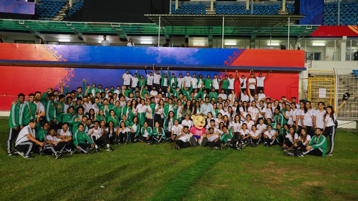 Volunteers at Goa's Pandit Jawaharlal Nehru Stadium at the end of a successful tournament