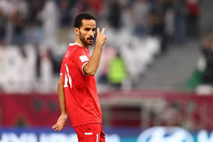 Mahmoud Al Mardi of Jordan celebrates after scoring their team's first goal