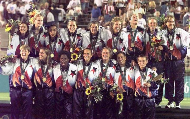 The Unites States women's national team celebrates winning the Women's Olympic Football Tournament 1996