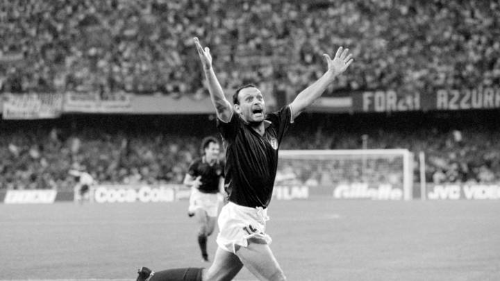 Italian forward Salvatore Schillaci exults after scoring his team's first goal during the World Cup semifinal soccer match between Italy and Argentina 03 July 1990 in Naples. Argentina and Italy played to a 1-1 tie but Argentina advanced to the finals with a 4-3 victory on penalty kicks dashing the hopes of Italian fans of a World Cup victory by their team on home soil. / AFP PHOTO / DANIEL GARCIA (Photo credit should read DANIEL GARCIA/AFP via Getty Images)