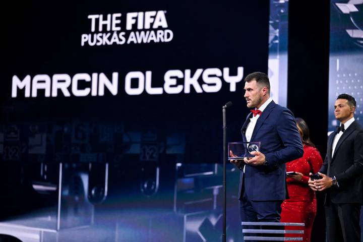 Marcin Oleksy on stage after winning the FIFA Puskas Award