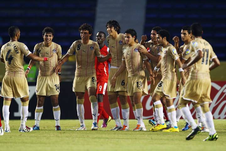 Ahmed Hegazi (C) of Egypt celebrates his team's first goal with team mates during the FIFA U-20 World Cup