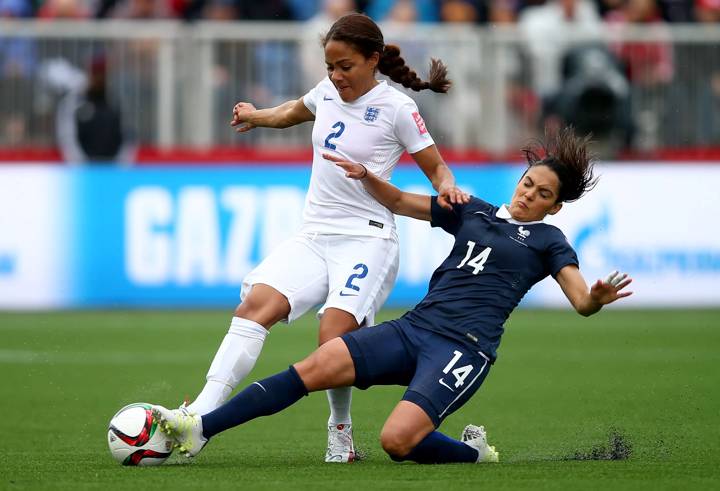 Alex Scott of England is challenged by Louisa Necib of France 