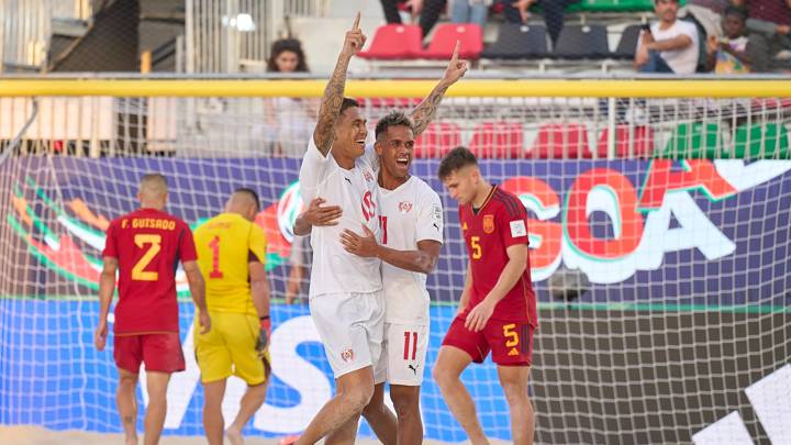 DUBAI, UNITED ARAB EMIRATES - FEBRUARY 17: Tearii Labaste of Tahiti celebrates after scoring goal with Teaonui Tehau of Tahiti   during the FIFA Beach Soccer World Cup UAE 2024 Group  B match between Spain and Tahiti at Dubai Design District Stadium on February 17, 2024 in Dubai, United Arab Emirates. (Photo by Aitor Alcalde - FIFA/FIFA via Getty Images)