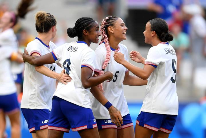 MARSEILLE, FRANCE - JULY 31: Trinity Rodman #5 of Team United States celebrates with teammates after scoring her team's first goal during the Women's group B match between Australia and United States during the Olympic Games Paris 2024 at Stade de Marseille on July 31, 2024 in Marseille, France. (Photo by Harriet Lander - FIFA/FIFA via Getty Images)