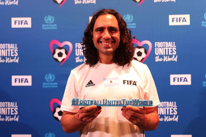 Legend Juan Pablo Sorin ot Argentina hold the Football Unites The World hashtag 