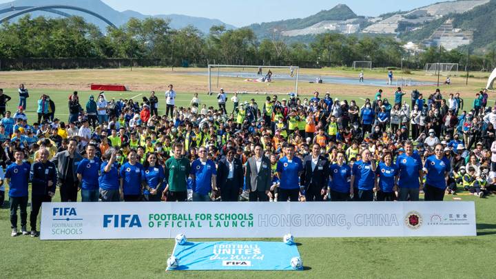 HONG KONG, CHINA - DECEMBER 08: HCA Education Executive Committee Mr. Cheung Wai, Football for Schools Director Fatimata Sidibe, and President Chairman of HKFA Eric Fok, FIFA Development Manager East Asia CJ Chen Jun , FIFA Manager F4s Niko Nhouvannasak , Technical consultant for FIFA Alberto Giacomini , and other guests and players pose for photo at the opening ceremony of the Football for Schools at HK Jockey Club National Training Centre on December 8, 2023 in Hong Kong, China. (Photo by Yu Chun Christopher Wong/FIFA)