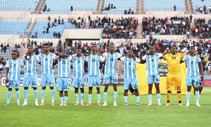 Botswana's players line up to sing their national anthem during the 2025 CAF Africa Cup of Nations (CAN) group C football match between Botswana and Egypt at Francistown Stadium in Francistown on September 10, 2024. (Photo by Monirul Bhuiyan / AFP) (Photo by MONIRUL BHUIYAN/AFP via Getty Images)