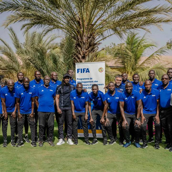 SALY, SENEGAL - FEBRUARY 24: Senegal National team manager Aliou Cissé (C) with attendees during a Coach Training Event on February 24, 2022 in Saly, Senegal. (Photo by Carmen Abd Ali - FIFA/FIFA via FactStory)