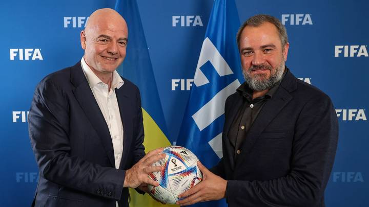 FRANCE, PARIS - JUNE 02: FIFA President Gianni Infantino (L) and Football Federation of Ukraine President Andriy Pavelko hold a match ball during a meeting at FIFA Paris Offices on June 2, 2022 in Paris, France. (Photo by Marc Piasecki- FIFA/FIFA via Getty Images).