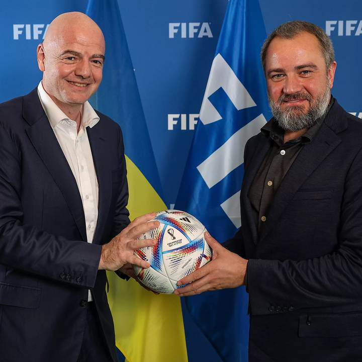 FRANCE, PARIS - JUNE 02: FIFA President Gianni Infantino (L) and Football Federation of Ukraine President Andriy Pavelko hold a match ball during a meeting at FIFA Paris Offices on June 2, 2022 in Paris, France. (Photo by Marc Piasecki- FIFA/FIFA via Getty Images).