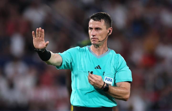 Referee Ilgiz Tantashev gestures