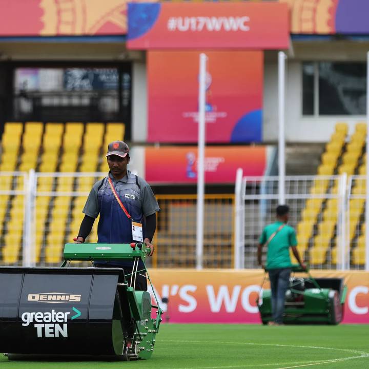 GOA, INDIA - OCTOBER 10: A member of the groundstaff prepares the pitch ahead of the FIFA U-17 Women's World Cup 2022 at the Pandit Jawaharlal Nehru Stadium on October 10, 2022 in Goa, India. (Photo by Matthew Lewis - FIFA/FIFA via Getty Images)