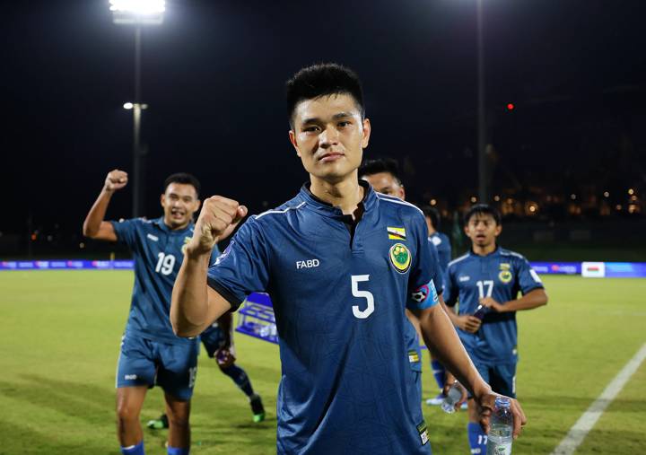 JEDDAH, SAUDI ARABIA - MARCH 26: Muhammad Nurikhwan Bin Othman of Brunei Darussalam celebrates after the team's victory during the FIFA Series 2024 Saudi Arabia match between Vanuatu and Brunei Darussalam at King Abdullah Sports City on March 26, 2024 in Jeddah, Saudi Arabia. (Photo by Yasser Bakhsh - FIFA/FIFA via Getty Images)