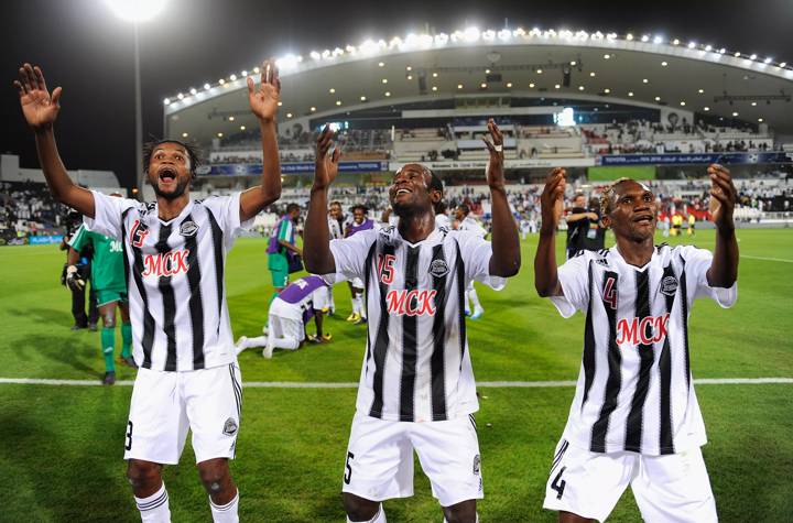 TP Mazembe players celebrate victory over Internacional