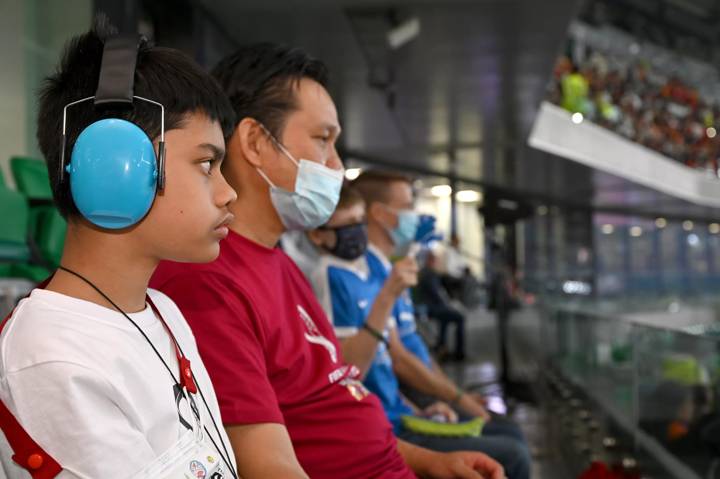 A young fan enjoys the sensory viewing room at Education City Stadium.