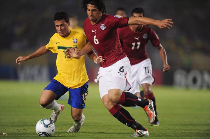 Philippe Coutinho of Brazil is tackled by Ahmed Hegazi of Egypt during the FIFA U-20 World Cup 