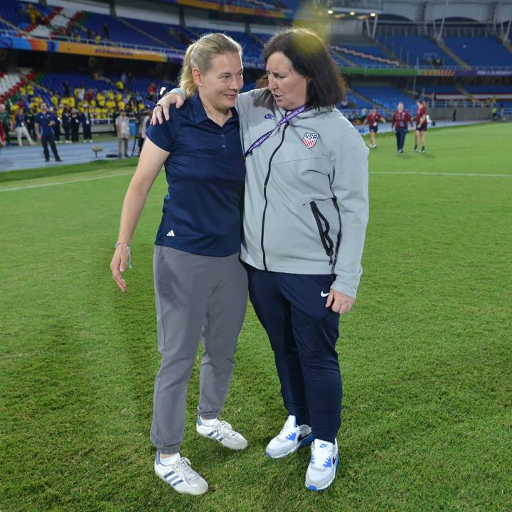 CALI, COLOMBIA - SEPTEMBER 15: (L-R)  Kathrin Peter, Head Coach of Germany, greets Tracey Kevins, Head Coach of USA, after a penalty shootout following the FIFA U-20 Women's World Cup Colombia 2024 Quarterfinal match between USA and Germany at Estadio Pascual Guerrero on September 15, 2024 in Cali, Colombia. (Photo by Gabriel Aponte - FIFA/FIFA via Getty Images)