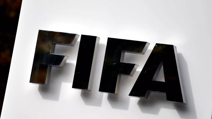 ZURICH, SWITZERLAND - OCTOBER 09:  A FIFA logo next to the entrance at the FIFA headquarters on October 9, 2015 in Zurich, Switzerland.  (Photo by Harold Cunningham/Getty Images)