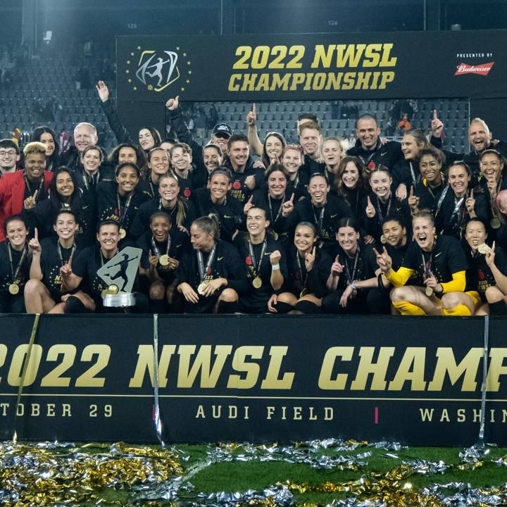 WASHINGTON, DC - OCTOBER 29: Members of the Portland Thorns FC hold the Championship Trophy to celebrate winning the 2022 National Womens Soccer League Championship Match against  Kansas City Current at Audi Field on October 29, 2022 in Washington, DC. (Photo by Ira L. Black/Getty Images)