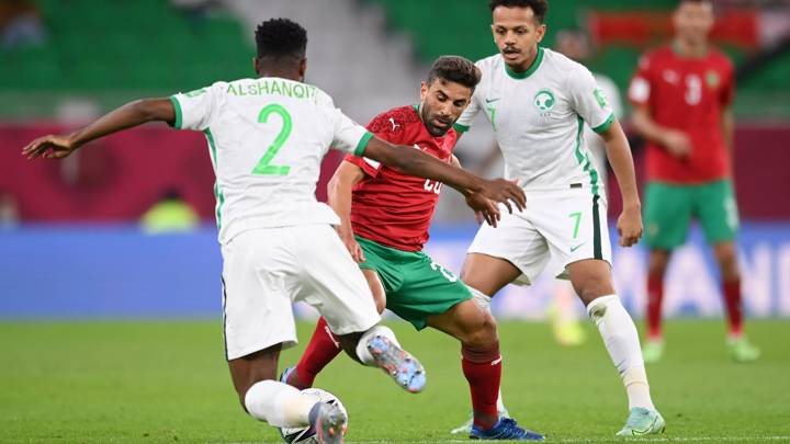 AL KHOR, QATAR - DECEMBER 07: Mohammed Fouzair of Morocco is challenged by Muhannad Alshanqiti of Saudi Arabia during the FIFA Arab Cup Qatar 2021 Group C match between Morocco and Saudi Arabia at Al Thumana Stadium on December 07, 2021 in Al Khor, Qatar. (Photo by Michael Regan - FIFA/FIFA via Getty Images)