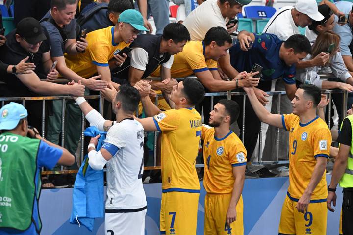 ANDIZHAN, UZBEKISTAN - SEPTEMBER 15: Players of Kazakhstan interact with fans after the FIFA Futsal World Cup Uzbekistan 2024 match between Spain and Kazakhstan at Andijan Universal Sports Complex on September 15, 2024 in Andizhan, Uzbekistan. (Photo by Anvar Ilyasov - FIFA/FIFA via Getty Images)