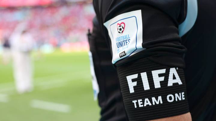 AL KHOR, QATAR - NOVEMBER 23: referee Football Unites the World and World Health Organization campaign batch   during the FIFA World Cup Qatar 2022 Group F match between Morocco and Croatia at Al Bayt Stadium on November 23, 2022 in Al Khor, Qatar. (Photo by Cathrin Mueller - FIFA/FIFA via Getty Images)