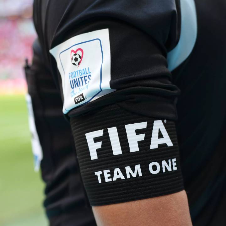 AL KHOR, QATAR - NOVEMBER 23: referee Football Unites the World and World Health Organization campaign batch   during the FIFA World Cup Qatar 2022 Group F match between Morocco and Croatia at Al Bayt Stadium on November 23, 2022 in Al Khor, Qatar. (Photo by Cathrin Mueller - FIFA/FIFA via Getty Images)